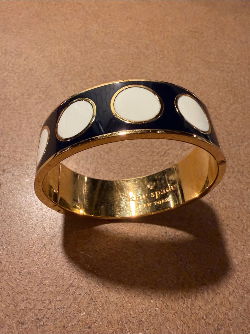 kate spade Gold-Tone Navy Bangle with White Polka Dots